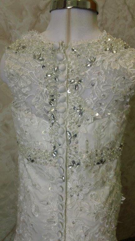 Covered buttons decorate dress back